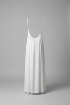 White slip dress on a gray background